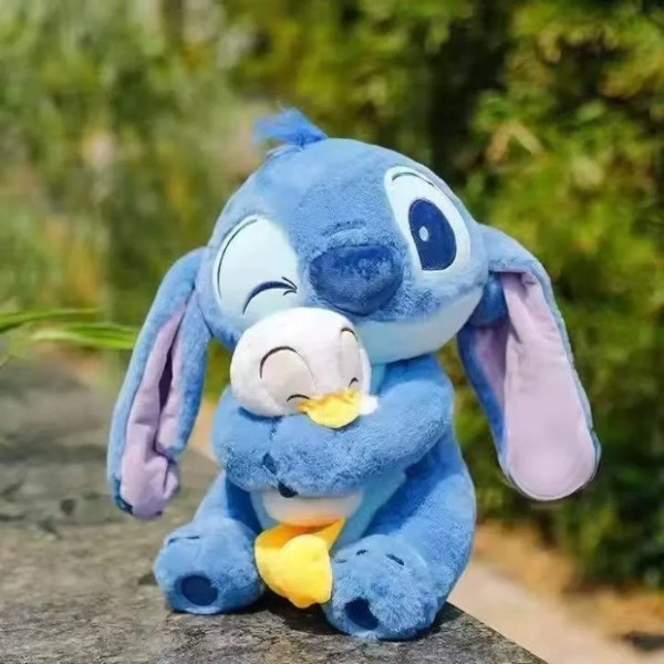 Фото - М'яка іграшка STITCH Стич з качкою 40 см (6928270764696)